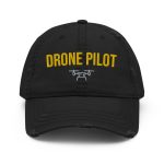 Professional drone pilot wearing Drone Pilot hat distressed brim - Aviation equipment for certified UAV operators