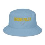 Professional drone pilot wearing Drone Pilot Organic Bucket Hat - Aviation equipment for certified UAV operators