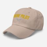 Professional drone pilot wearing Drone Pilot Logo Hat - Aviation equipment for certified UAV operators