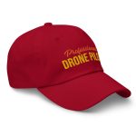 Professional drone pilot wearing Drone Pilot Cap, Hat for Drone Operators, Professional Drone Pilot - Aviation equipment for certified UAV operators